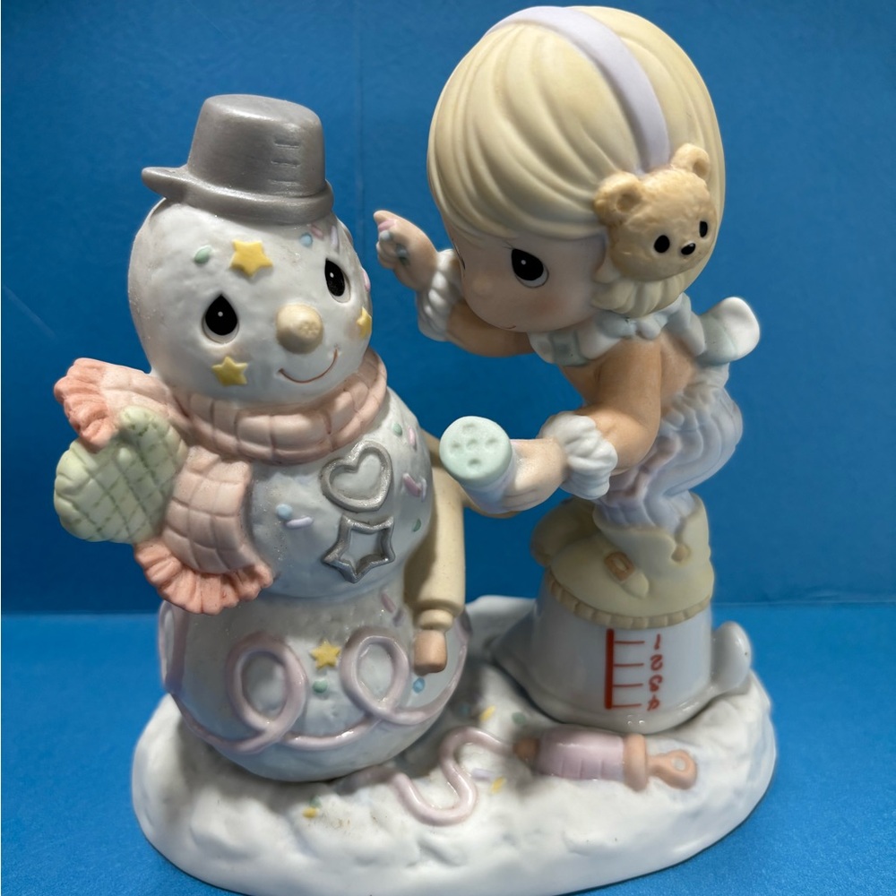 Charming Snowman Figurine with Child by Precious Moments